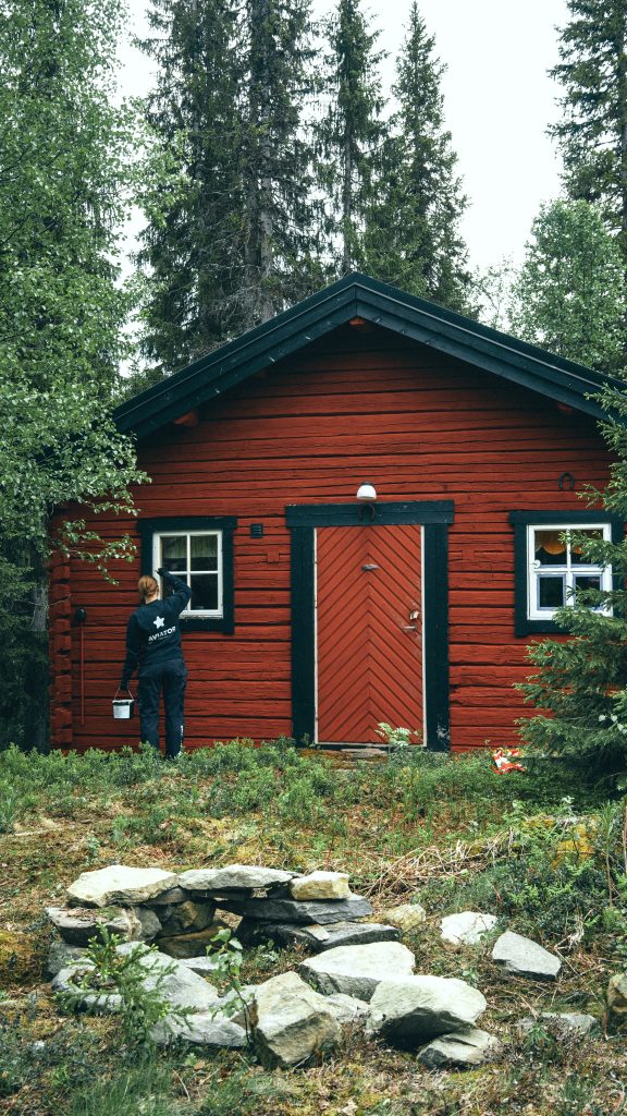 Small red wooden house.